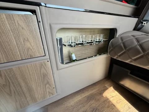 Wood cabinetry with built-in bar storage