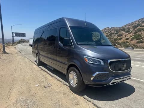 Executive van on a mountain road