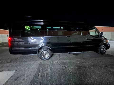 Executive van, rear view at night
