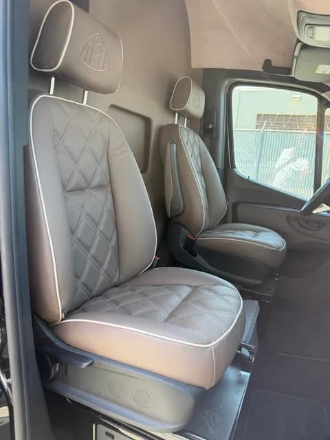 Captain's chairs beside the side entry door